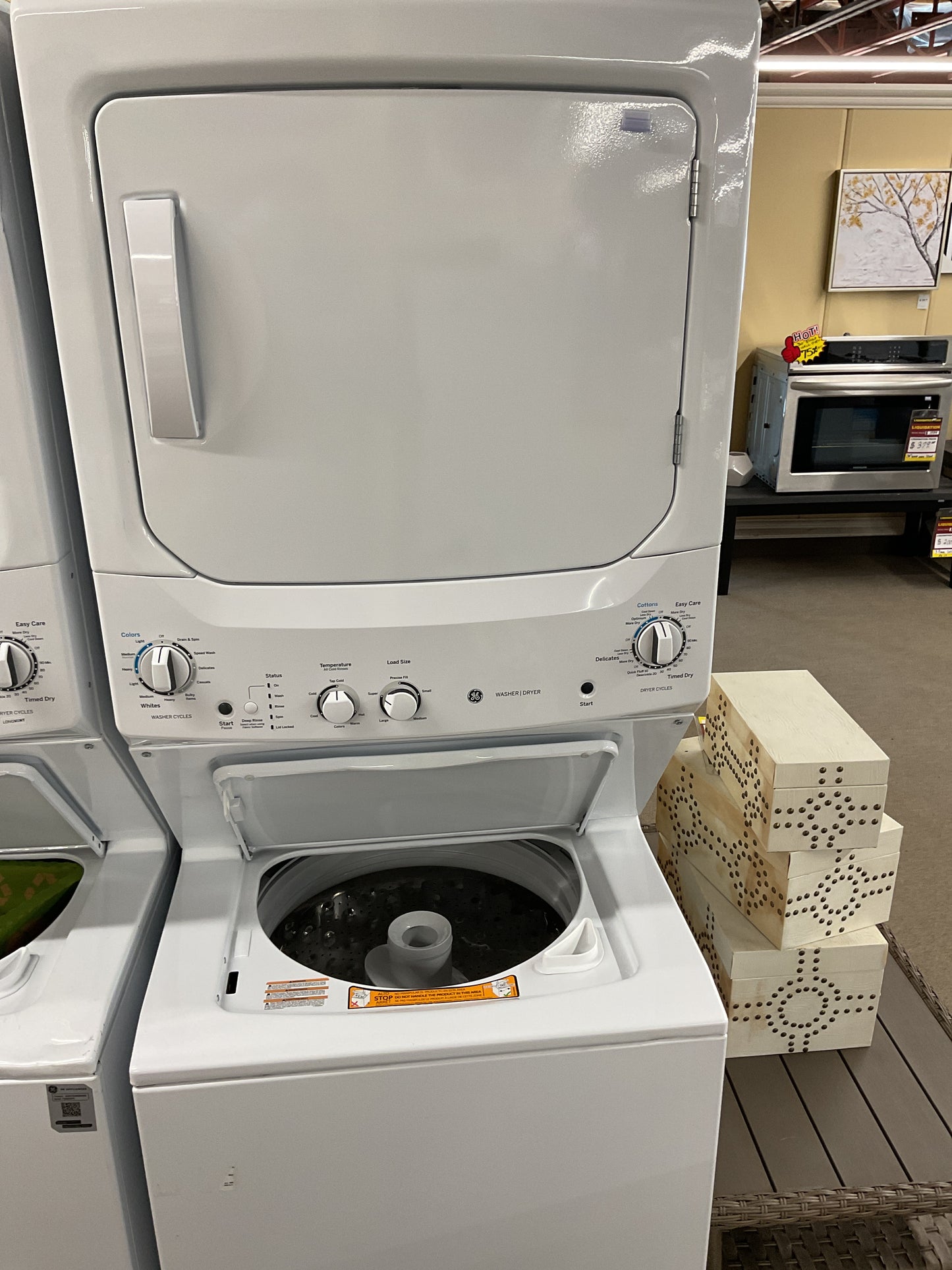 GE Electric Unitized Spacemaker 4.4Cu. Ft. (IEC) Washer / 5.9 Cu. Ft. Dryer White - GUD27ESMMWW